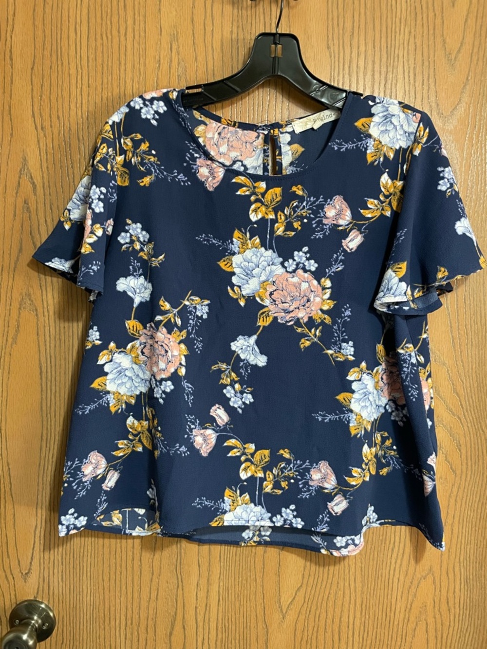 Navy Floral Blouse with Flutter Sleeves and Keyhole Back
